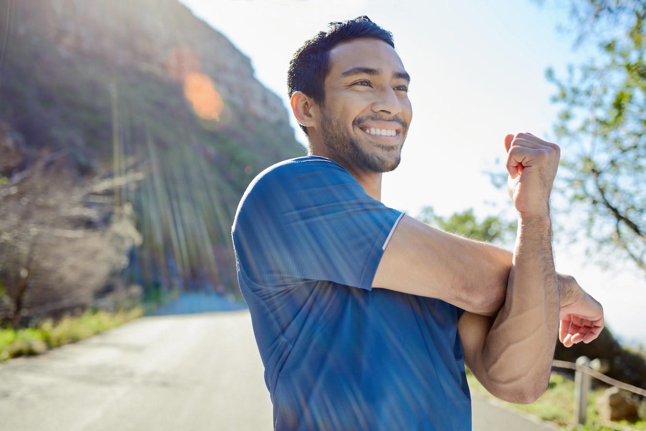 Man stretching outdoors